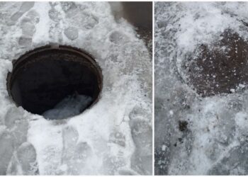 Жители одной из улиц Днепра год прожили с открытым посреди дороги люком – Дніпро